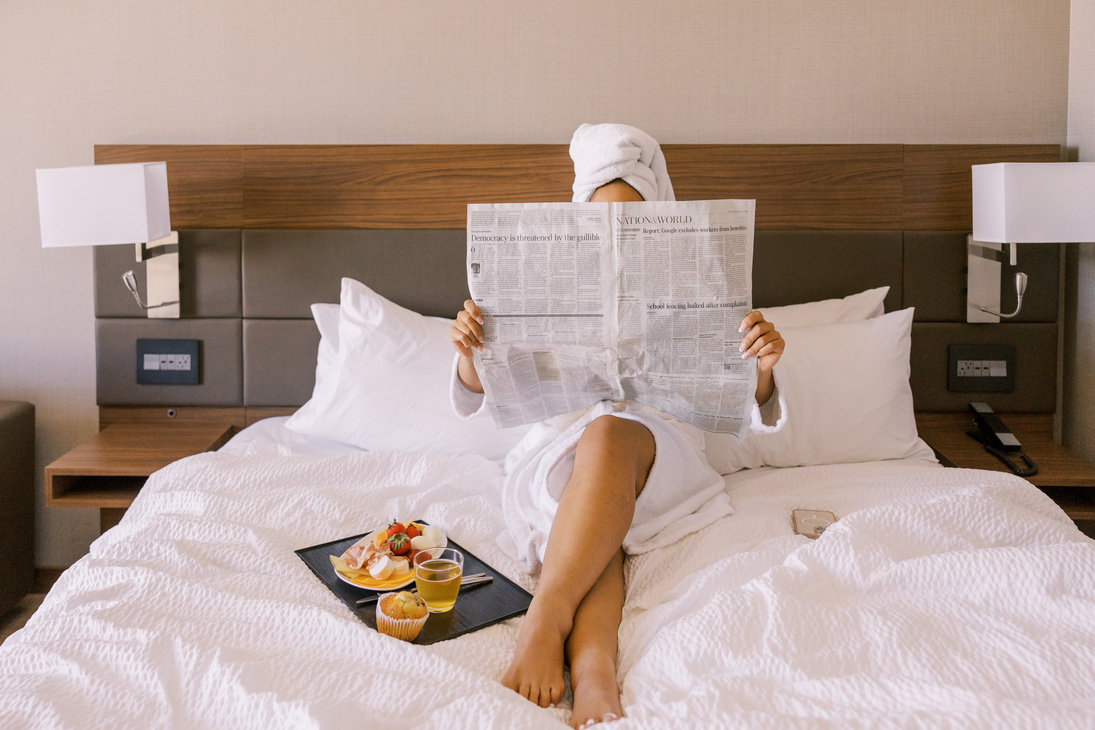 Staycation Woman Having Breakfast in Bed